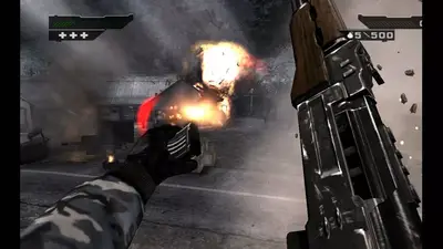 First-person view in BLACK on Android: a pistol firing in a burning street while an assault rifle is held ready, debris in the air
