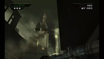 A damaged tower collapsing in smoke in BLACK, seen from below with a heavy weapon in hand